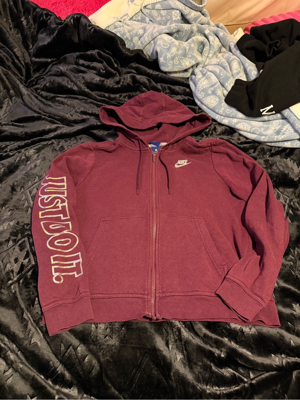 Women’s burgundy nike zip up with chrome writing